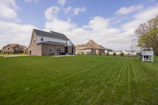 a house view with a garden space