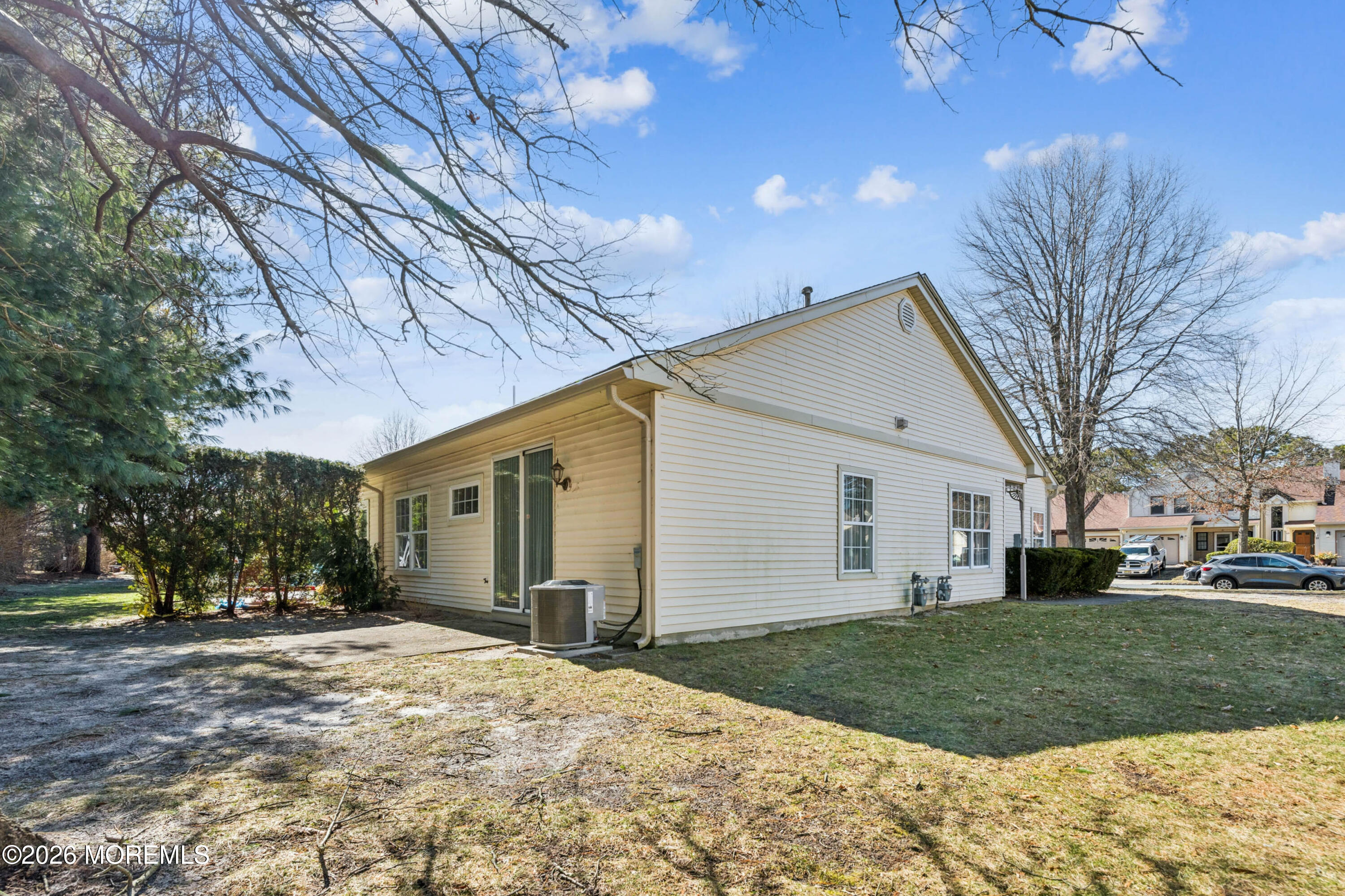 56 Riva Boulevard Brick, NJ 08723 - Photo 1 of 29 a view of a house with a yard