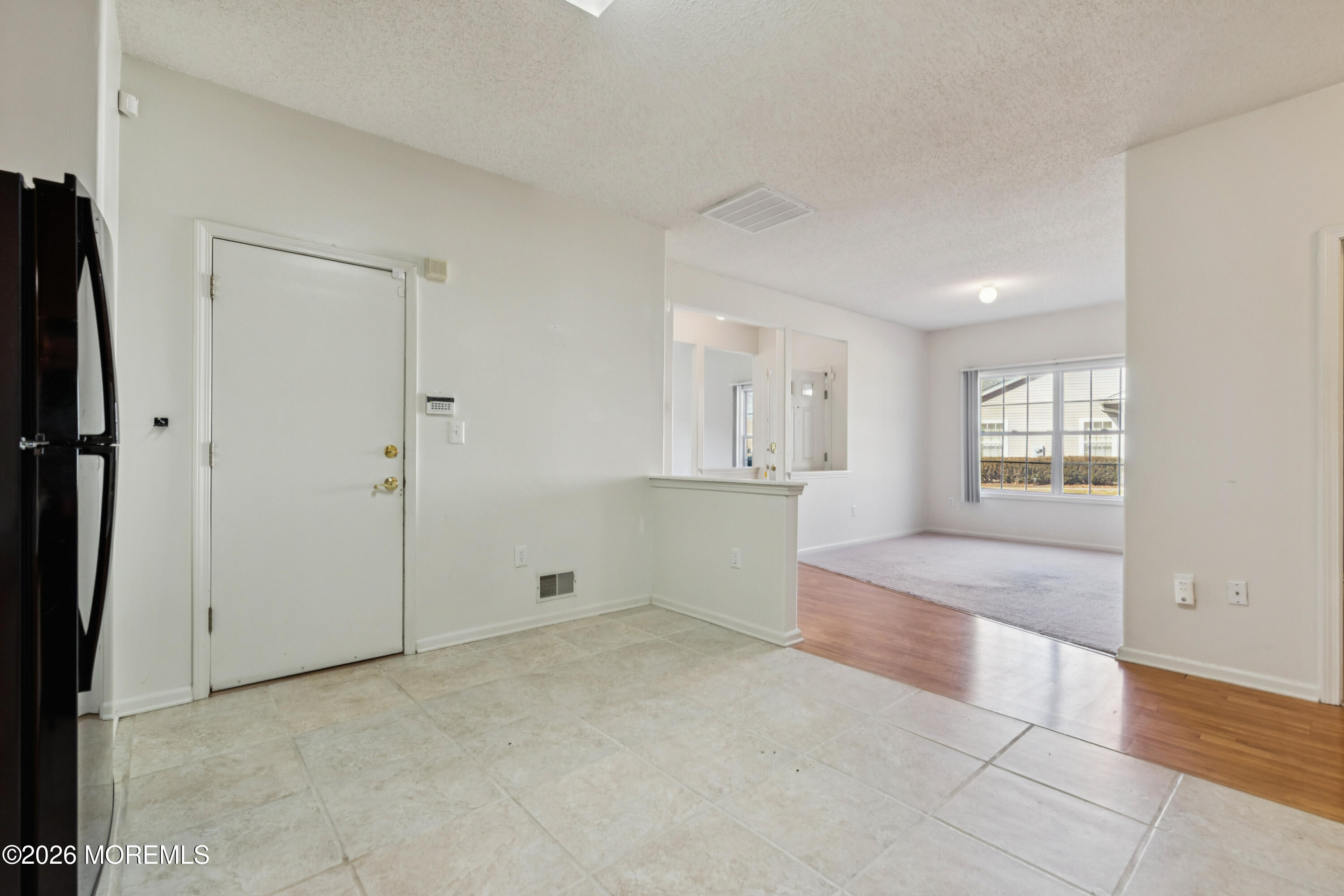 56 Riva Boulevard Brick, NJ 08723 - Photo 11 of 29 a view of an empty room with a window