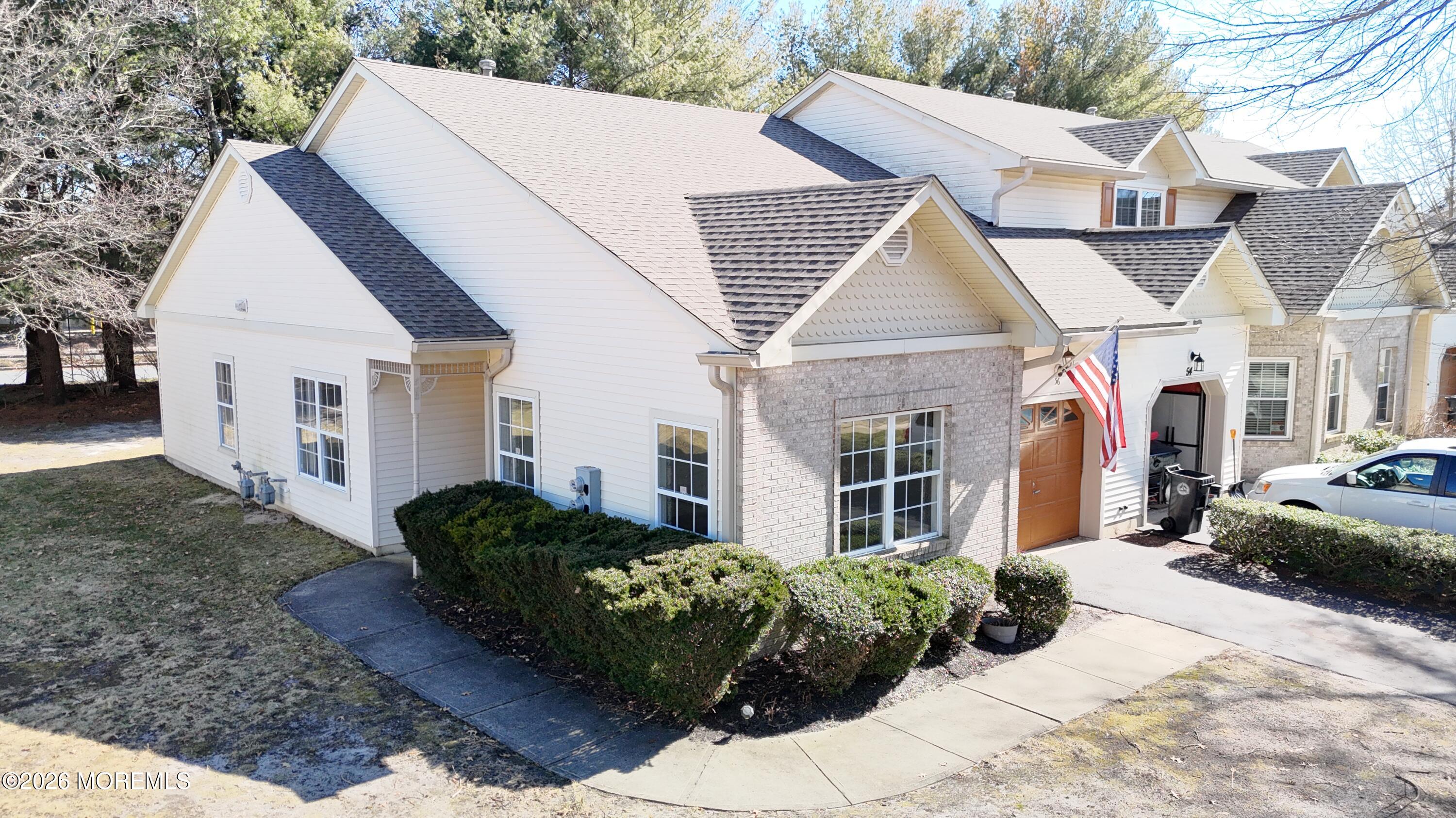 56 Riva Boulevard Brick, NJ 08723 - Photo 12 of 29 a view of a house with a yard