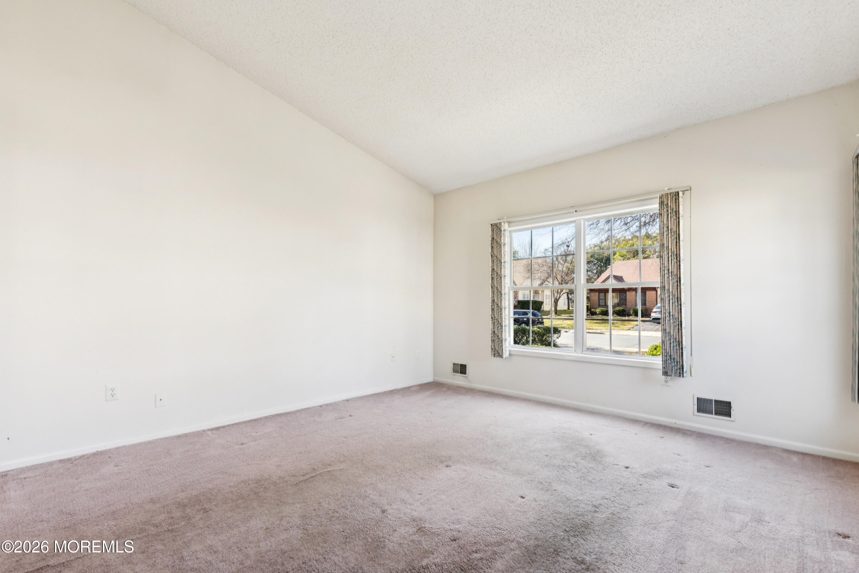 56 Riva Boulevard Brick, NJ 08723 - Photo 25 of 29 an empty room with a window