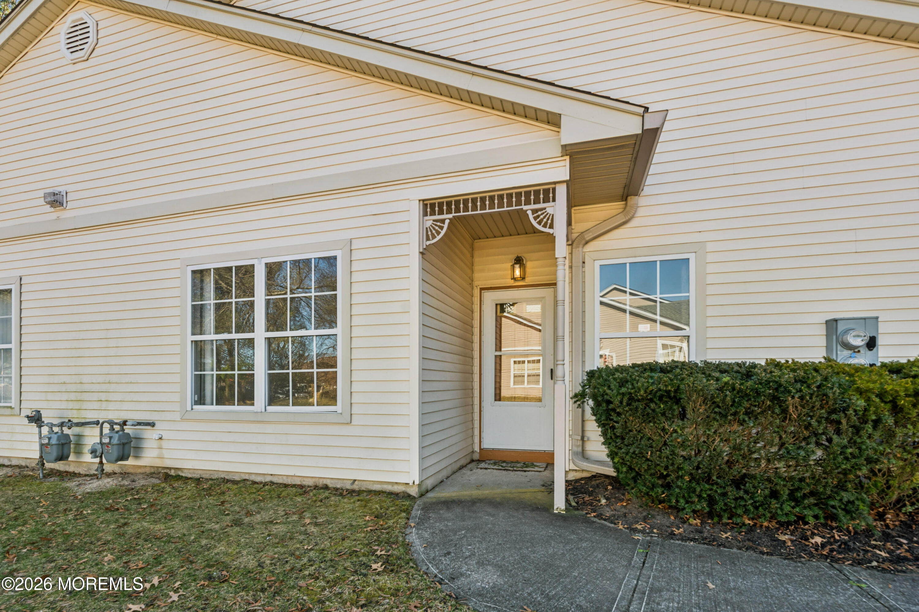 56 Riva Boulevard Brick, NJ 08723 - Photo 8 of 29 a front view of a house with a yard