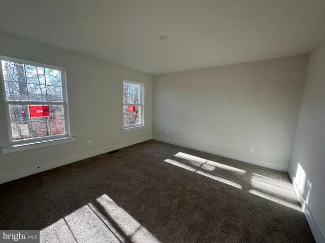 a view of an empty room with window