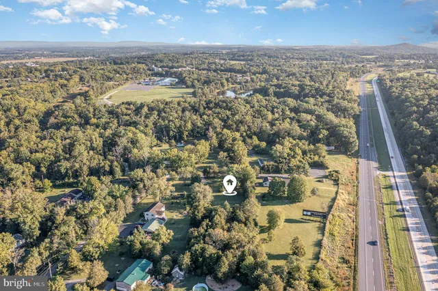 an aerial view of residential building with parking space