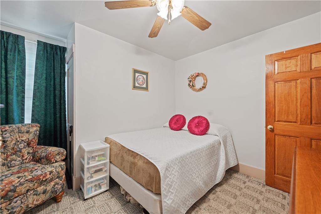 14 Pumpkin Center Road Finleyville, PA 15332 - Photo 16 of 34 a bedroom with a bed and a dresser