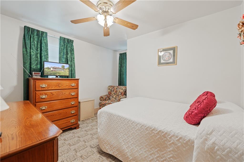 14 Pumpkin Center Road Finleyville, PA 15332 - Photo 17 of 34 a bedroom with a bed and a dresser