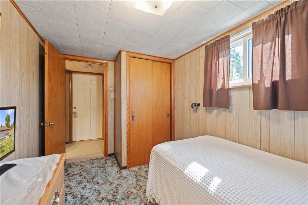 14 Pumpkin Center Road Finleyville, PA 15332 - Photo 19 of 34 a bedroom with a bed and a dresser