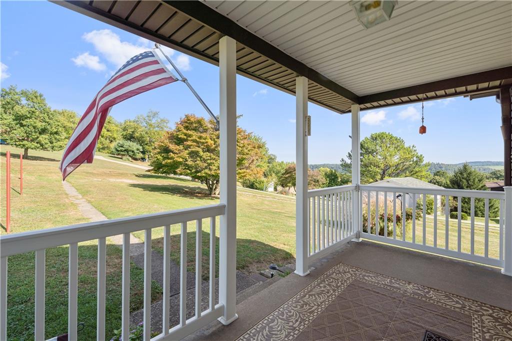 14 Pumpkin Center Road Finleyville, PA 15332 - Photo 24 of 34 a view of balcony with wooden floor