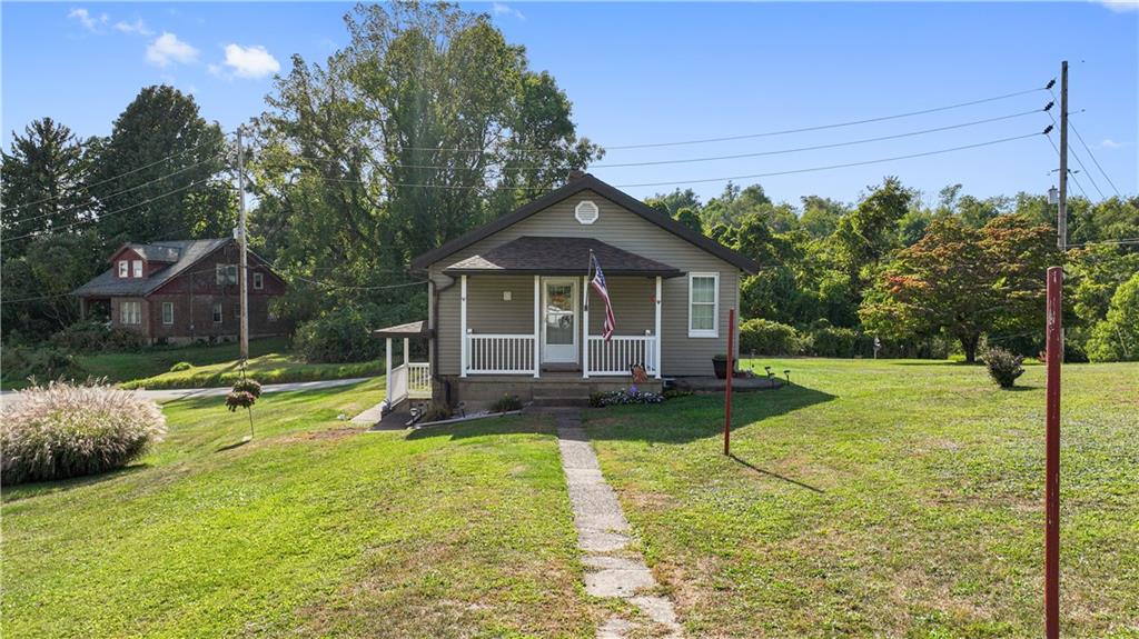 14 Pumpkin Center Road Finleyville, PA 15332 - Photo 25 of 34 a view of a house with a yard patio and swimming pool