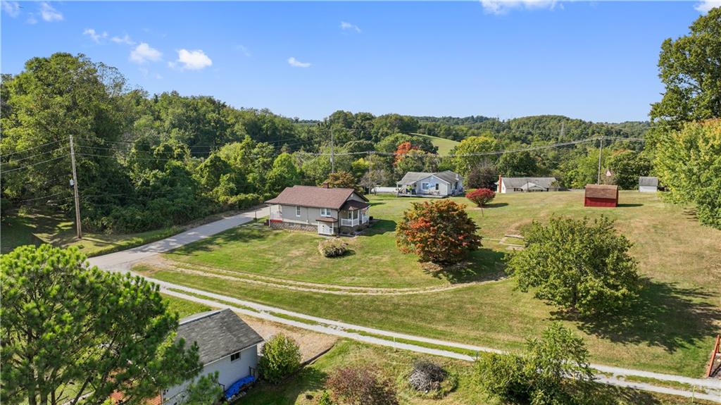 14 Pumpkin Center Road Finleyville, PA 15332 - Photo 29 of 34 a view of a tennis ground with large trees