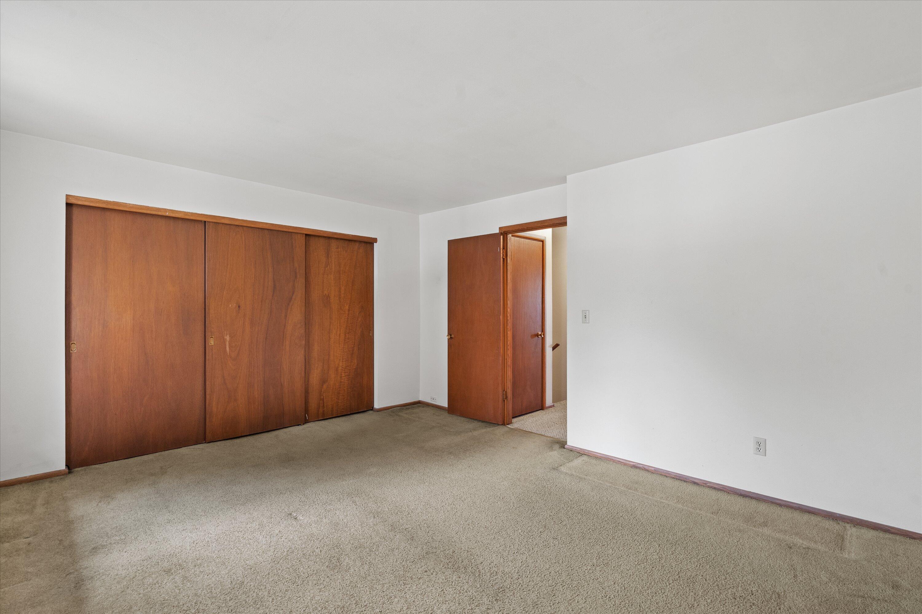 9903 Beloit Road, Unit F10 Milwaukee, WI 53227 - Photo 16 of 30 16-Primary Bedroom w_ Large Closet