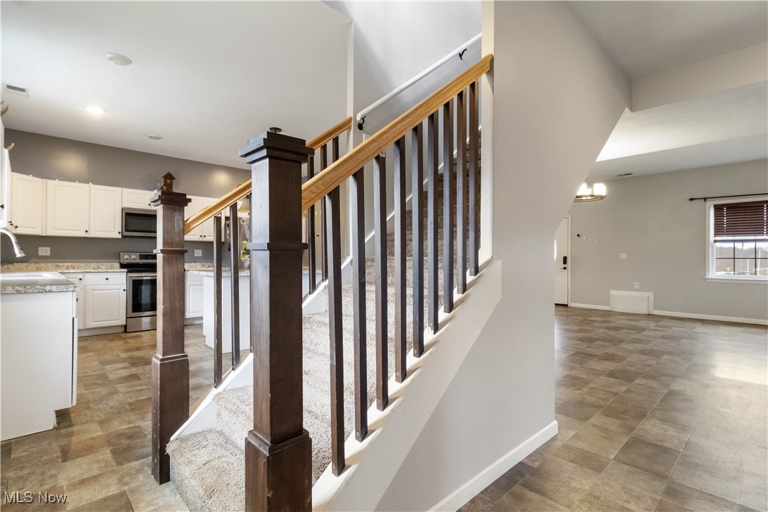 57459 Shry Road Barnesville, OH 43713 - Photo 8 of 44 Staircase with baseboards