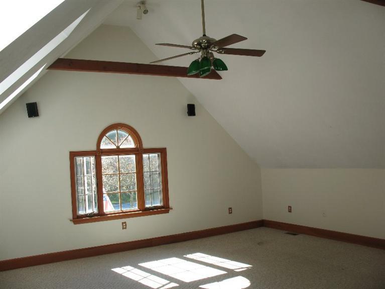 6 Yearling Run Road Buzzards Bay, MA 02532 - Photo 23 of 34 an empty room with a window