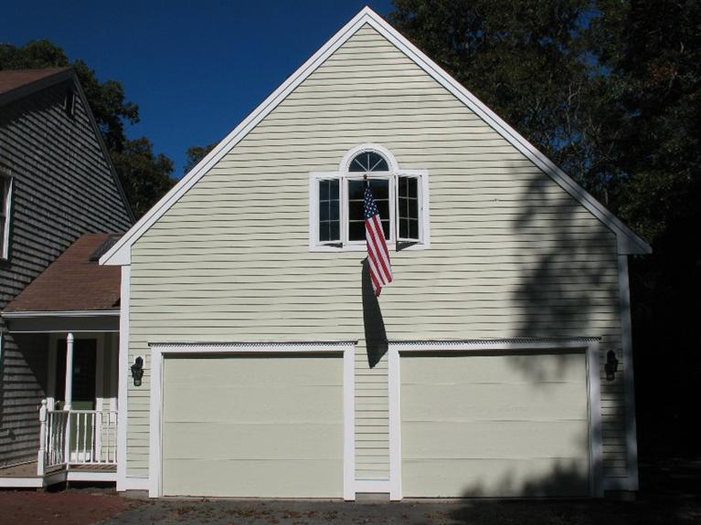 6 Yearling Run Road Buzzards Bay, MA 02532 - Photo 33 of 34 a view of a house with a garage