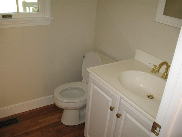 6 Yearling Run Road Buzzards Bay, MA 02532 - Photo 9 of 34 a bathroom with a sink and a toilet