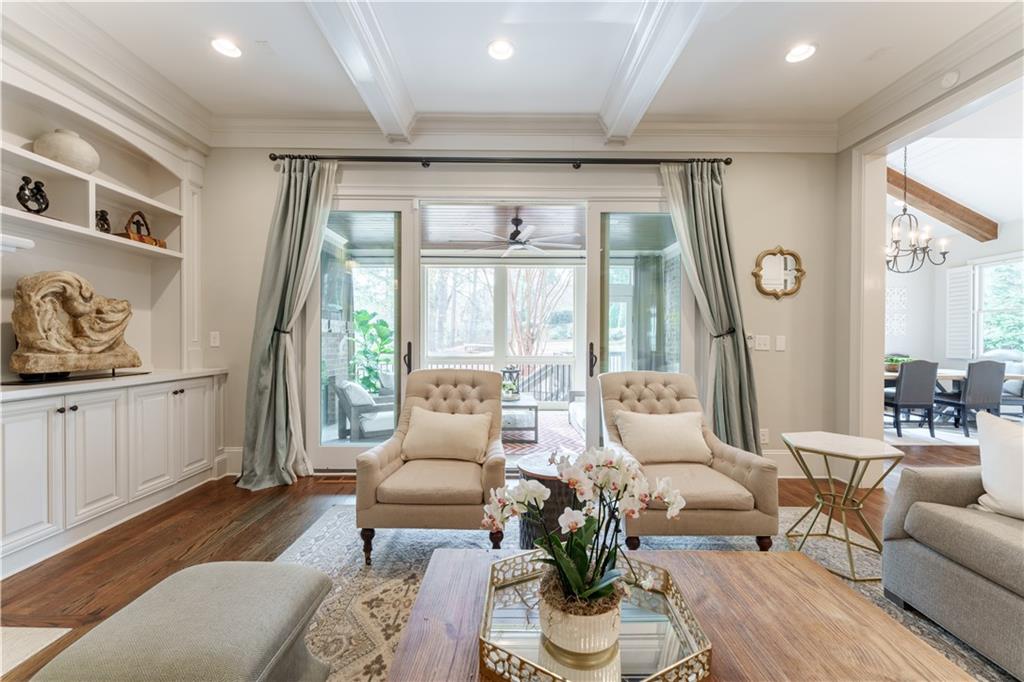 999 Ferncliff Road Northeast Atlanta, GA 30324 - Photo 11 of 52 a living room with furniture and a large window
