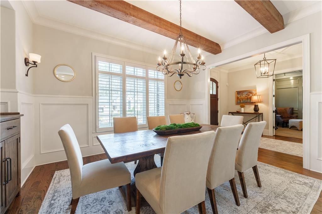 999 Ferncliff Road Northeast Atlanta, GA 30324 - Photo 19 of 52 a view of a dining room with furniture window and wooden floor