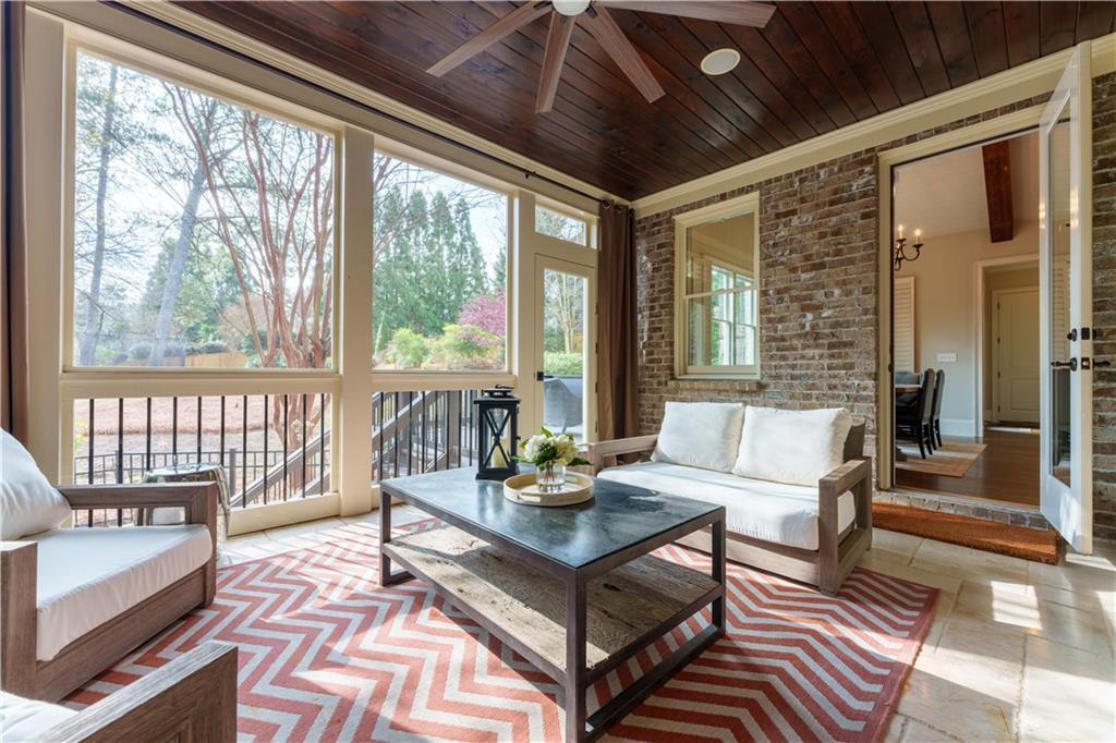 999 Ferncliff Road Northeast Atlanta, GA 30324 - Photo 22 of 52 a living room with furniture and a window