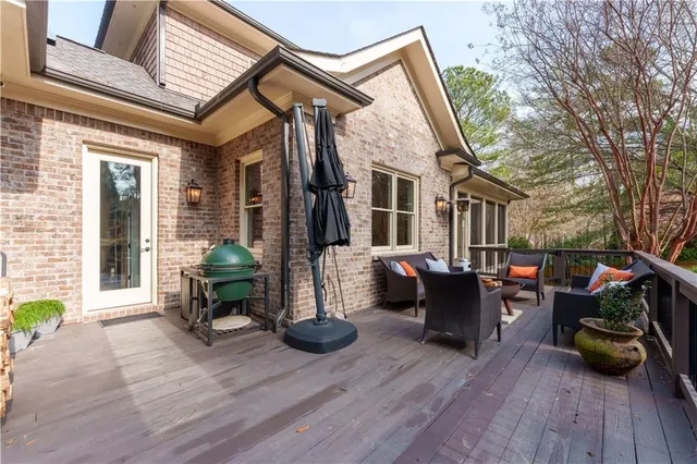 a view of living room with deck and furniture