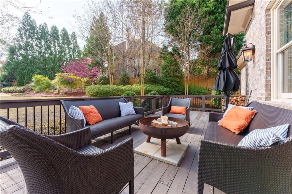 999 Ferncliff Road Northeast Atlanta, GA 30324 - Photo 27 of 52 a outdoor living room with patio furniture and a potted plant