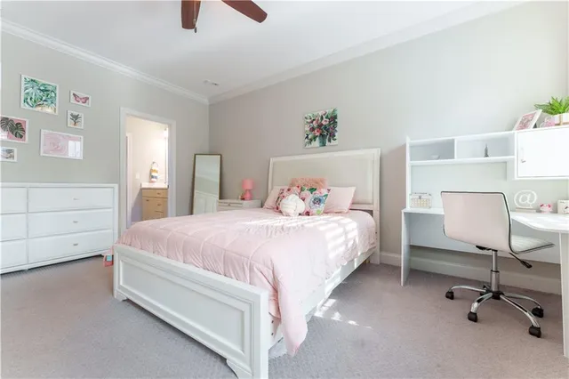 a bedroom with a bed and a cabinets