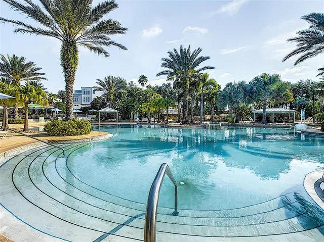 a view of an chairs and table in the patio