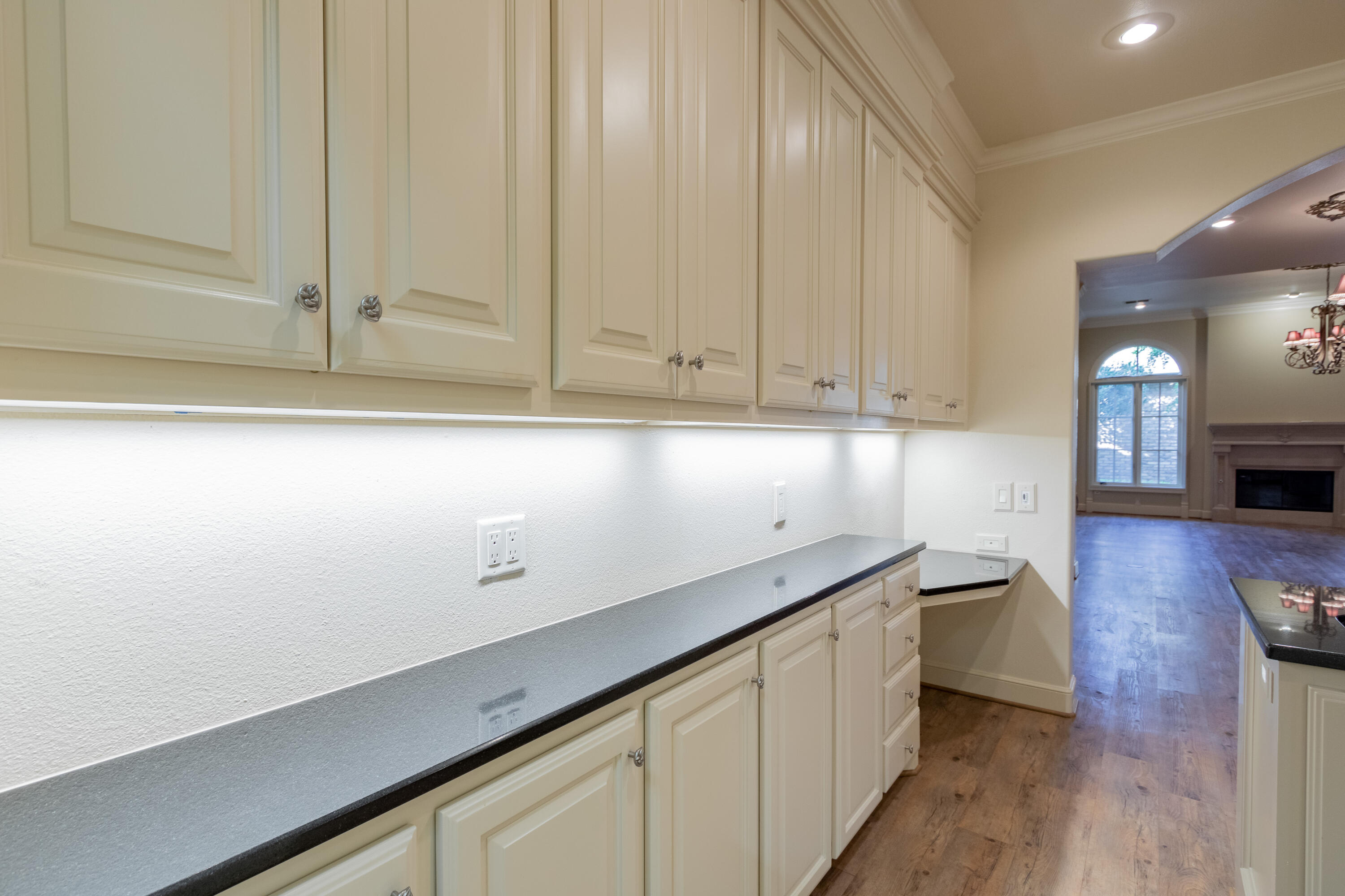4501 19th Street, Unit 5 Lubbock, TX 79407 - Photo 26 of 52 a kitchen with a sink and cabinets
