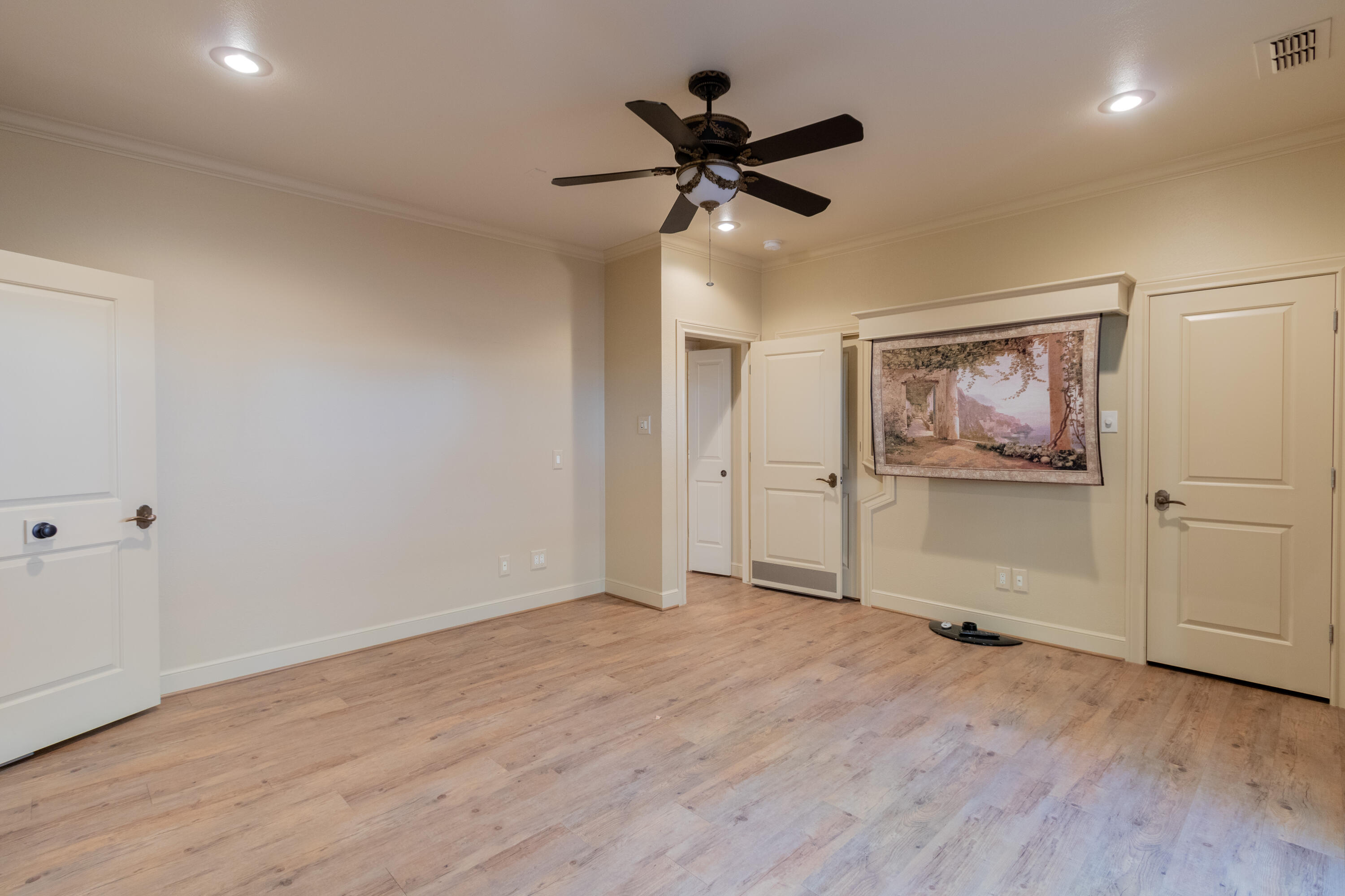 4501 19th Street, Unit 5 Lubbock, TX 79407 - Photo 32 of 52 wooden floor in an empty room
