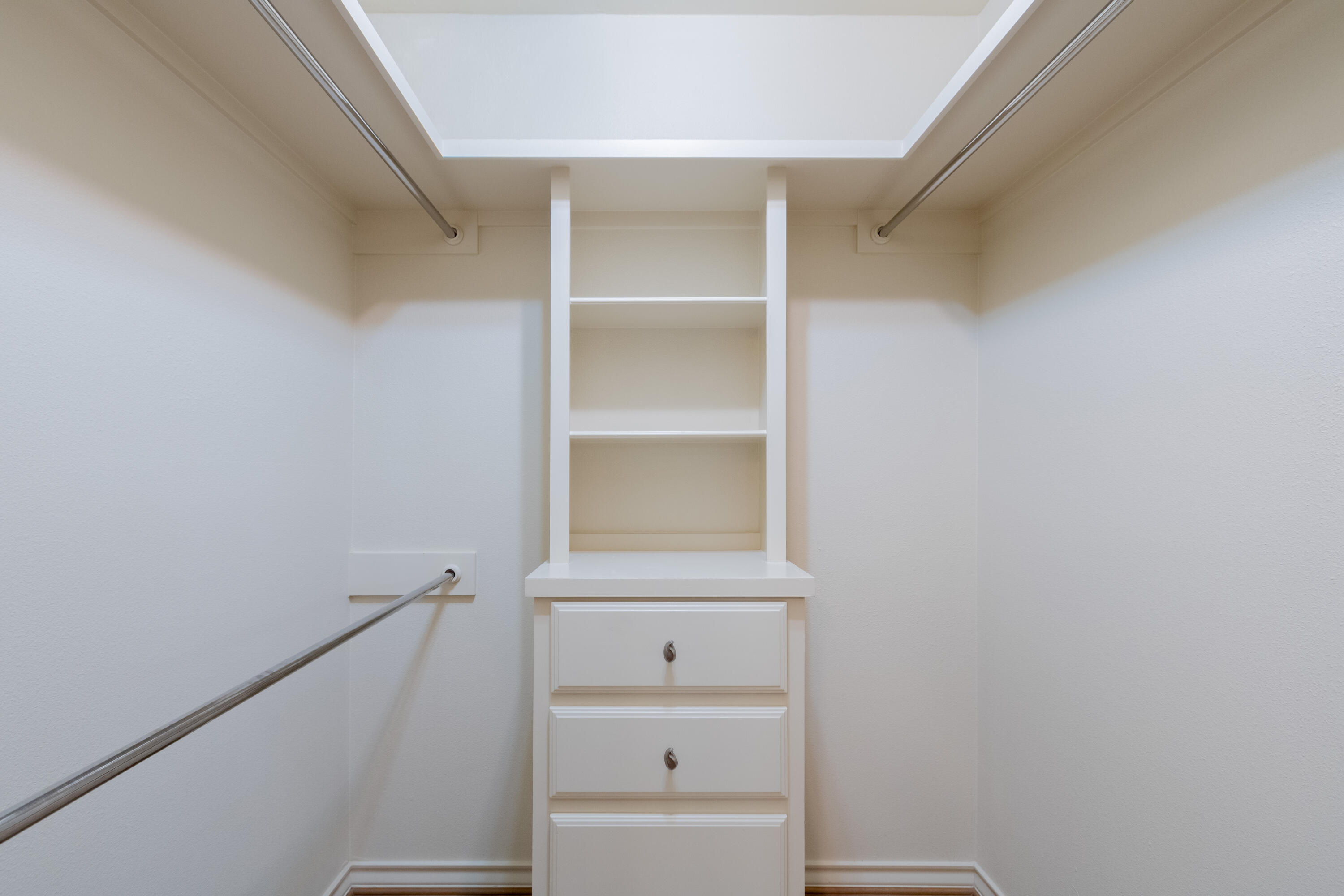 4501 19th Street, Unit 5 Lubbock, TX 79407 - Photo 37 of 52 a view of an empty walk in closet