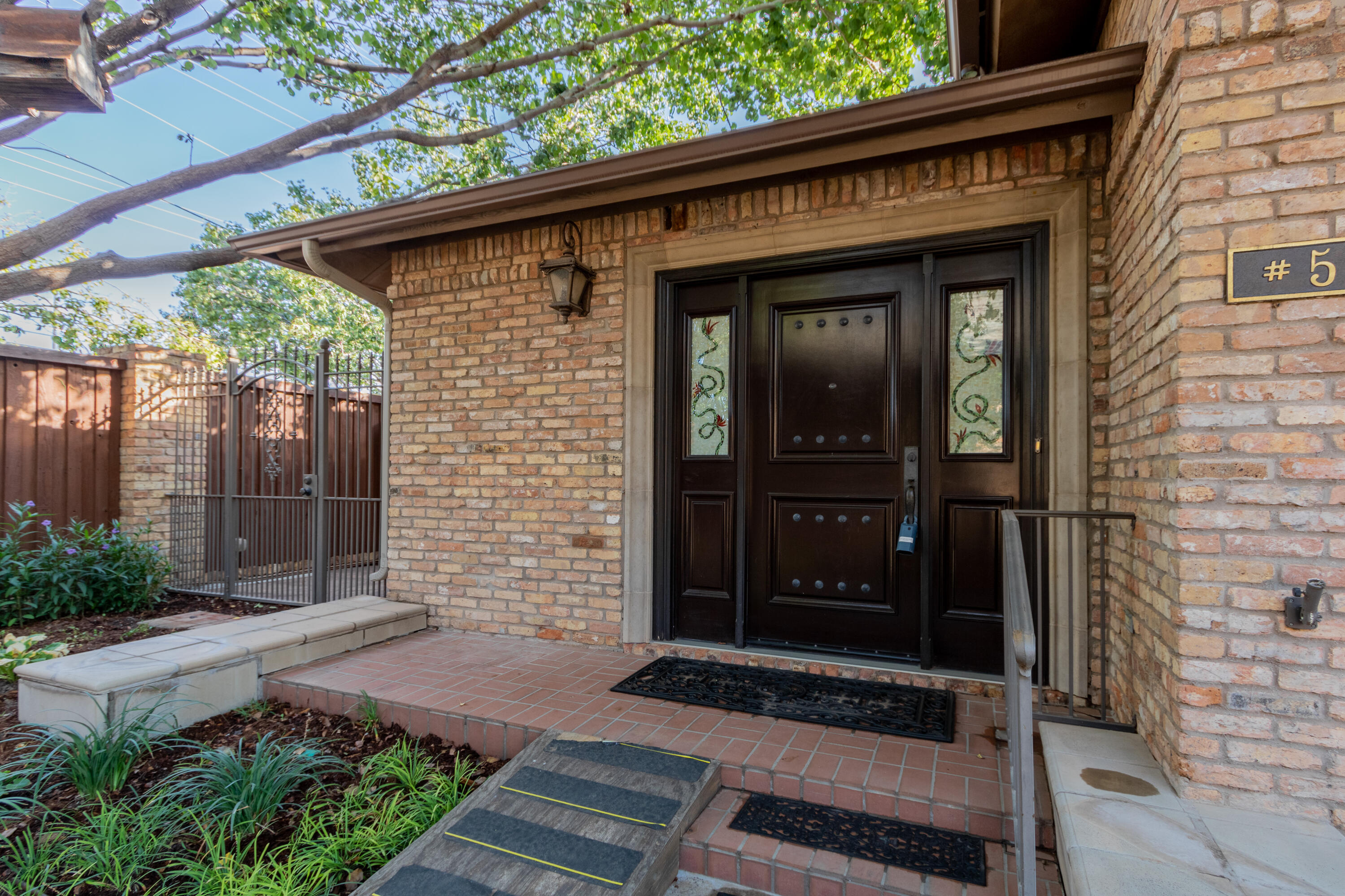 4501 19th Street, Unit 5 Lubbock, TX 79407 - Photo 5 of 52 a front view of a house