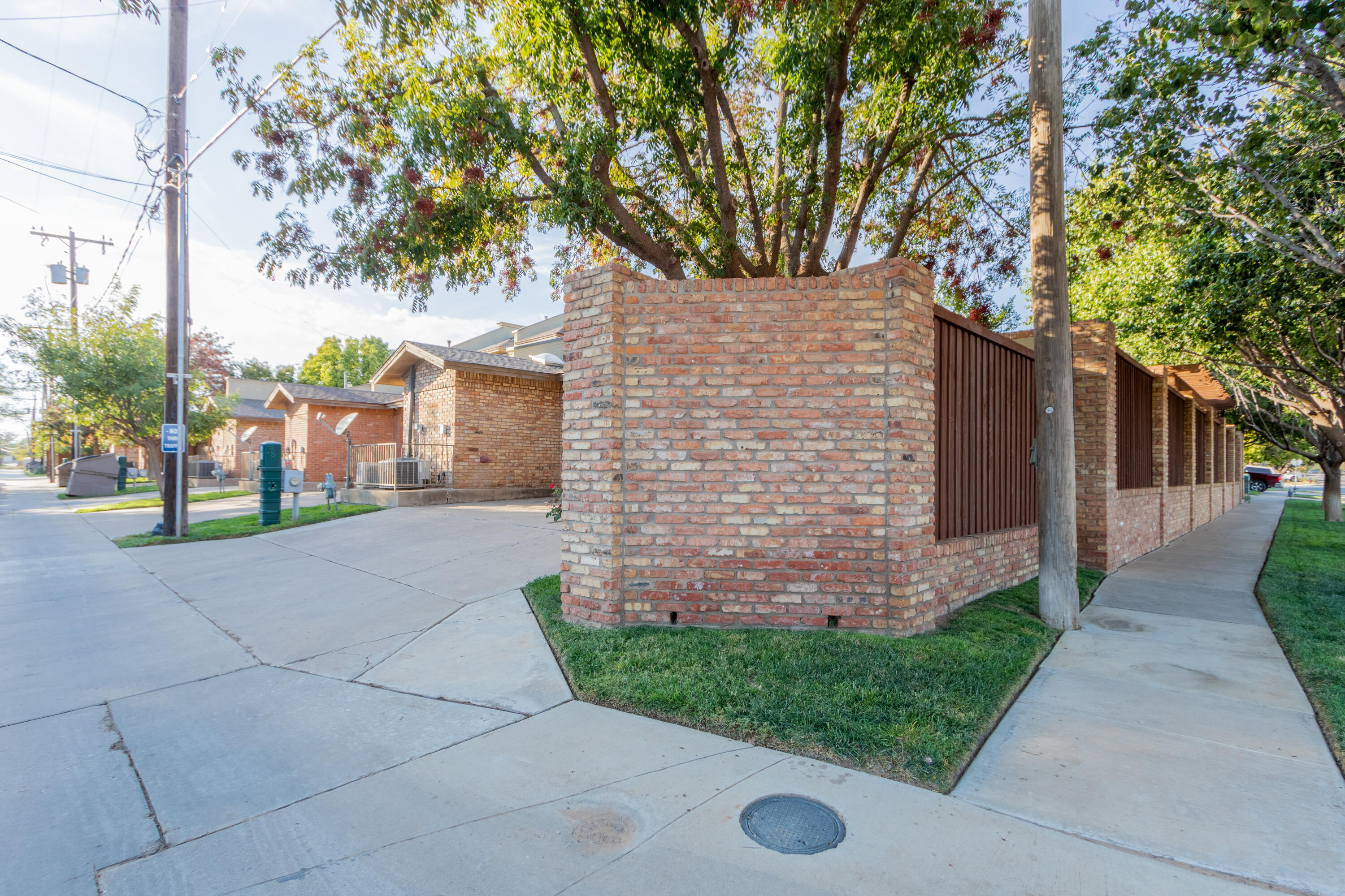 4501 19th Street, Unit 5 Lubbock, TX 79407 - Photo 52 of 52 a front view of a house with a yard