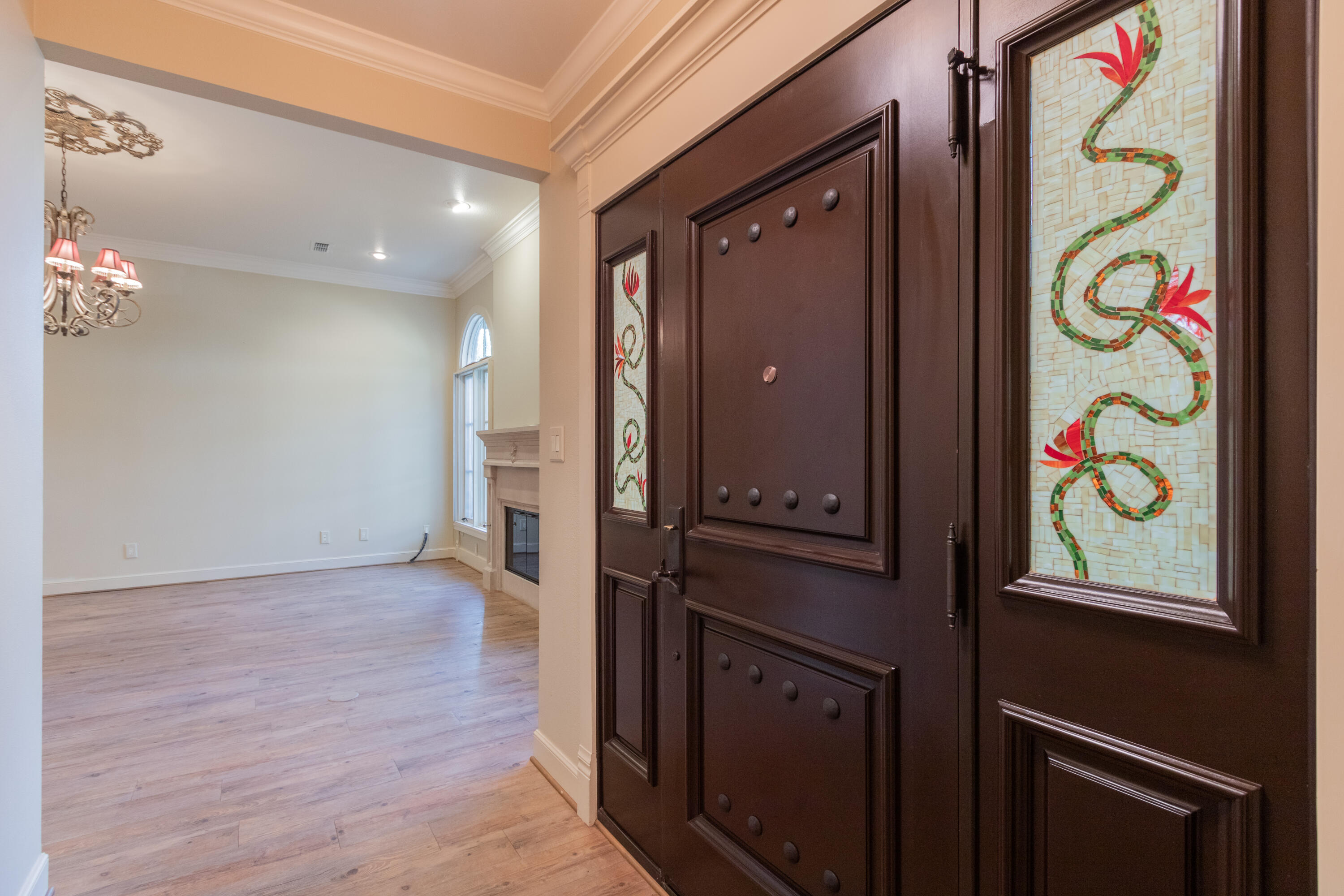 4501 19th Street, Unit 5 Lubbock, TX 79407 - Photo 7 of 52 a view of an entryway with wooden floor