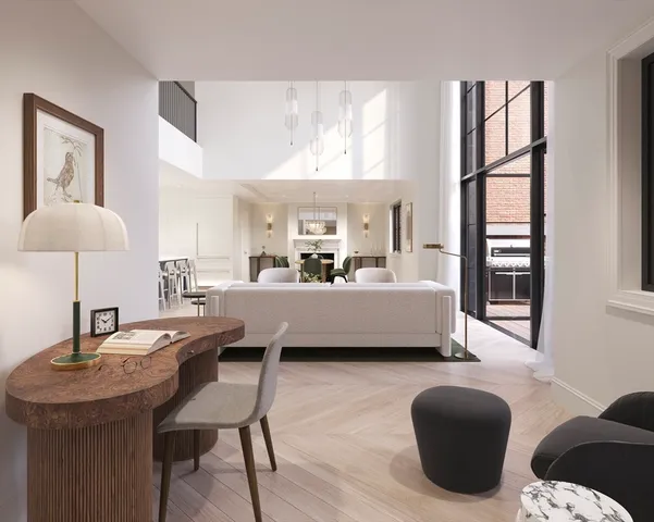 a living room with furniture and a table