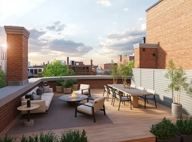 a view of a terrace with furniture