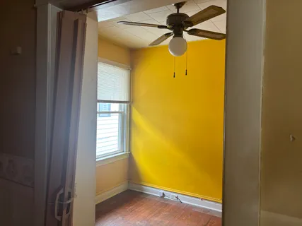 a view of a room with a window