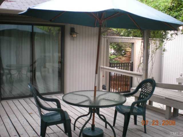 2713 Rue Sans Famille Raleigh, NC 27607 - Photo 11 of 12 a view of a chairs and table in the balcony