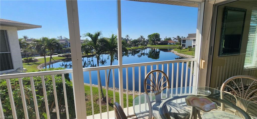 91 Georgetown Boulevard, Unit 91 Naples, FL 34112 - Photo 1 of 22 Stunning Lake Views