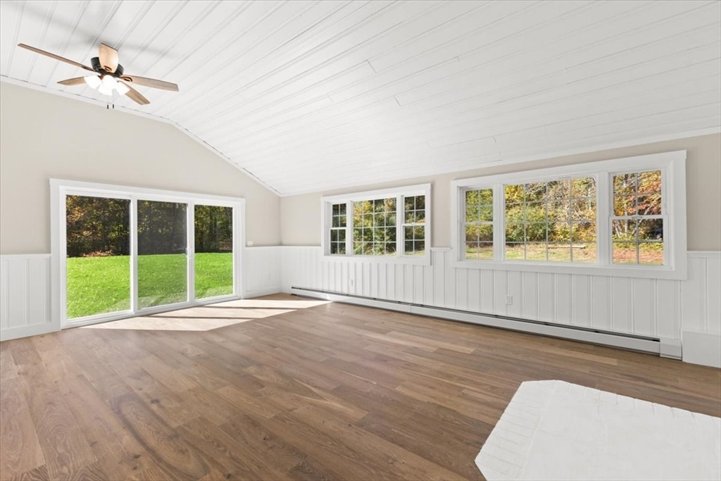 146 Miller Street Middleboro, MA 02346 - Photo 12 of 23 a view of an empty room with a window and wooden floor