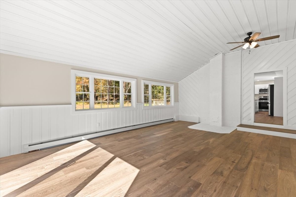 146 Miller Street Middleboro, MA 02346 - Photo 13 of 23 a view of an empty room with a window and wooden floor