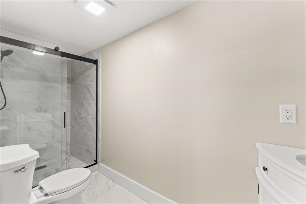 146 Miller Street Middleboro, MA 02346 - Photo 22 of 23 a bathroom with a toilet and a shower