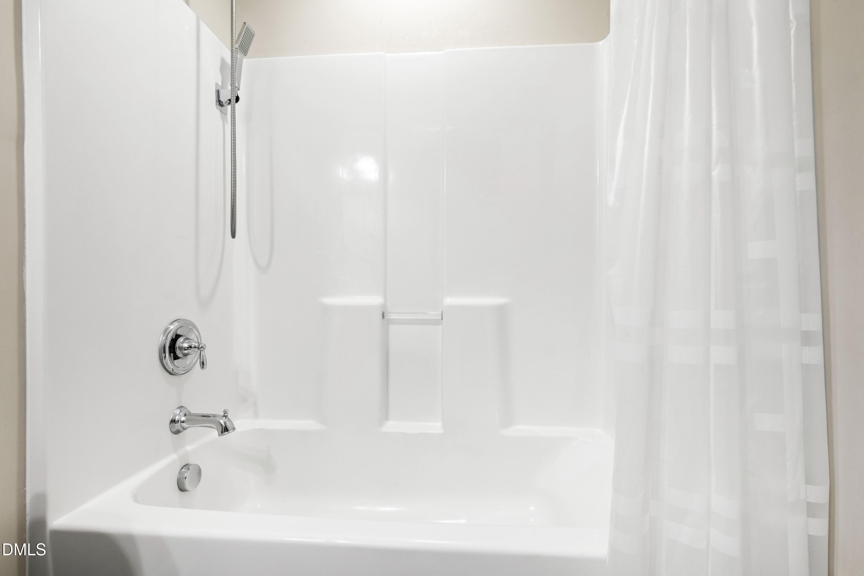 1118 Renewal Place Raleigh, NC 27603 - Photo 26 of 38 a white bath tub sitting next to a white sink