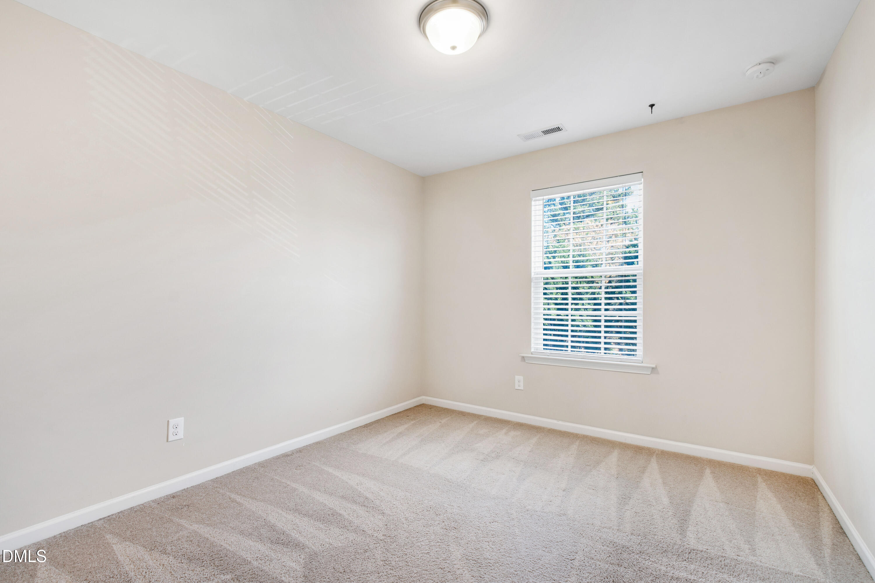 1118 Renewal Place Raleigh, NC 27603 - Photo 27 of 38 an empty room with a window
