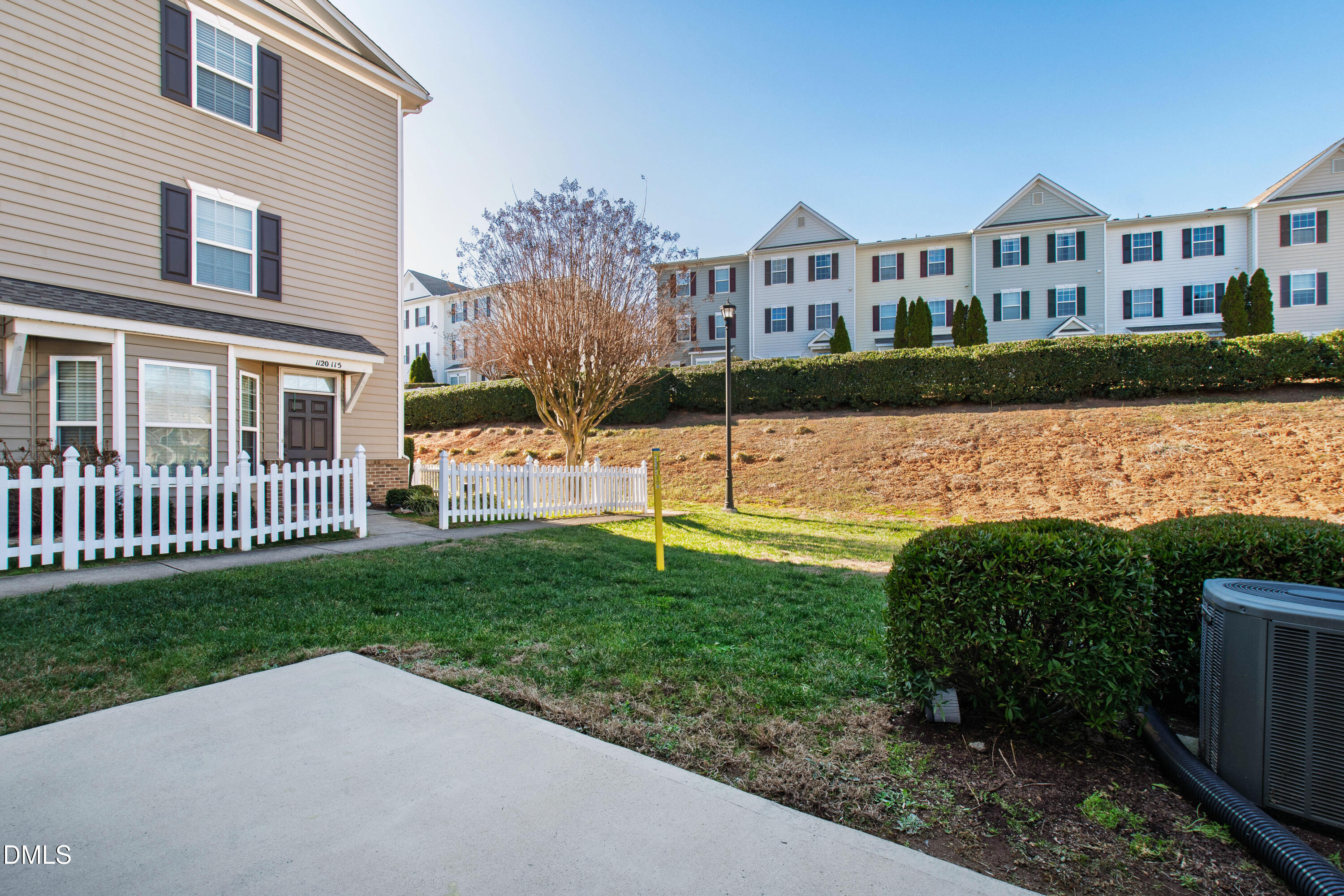 1118 Renewal Place Raleigh, NC 27603 - Photo 32 of 38 a view of a house with a yard and a garden