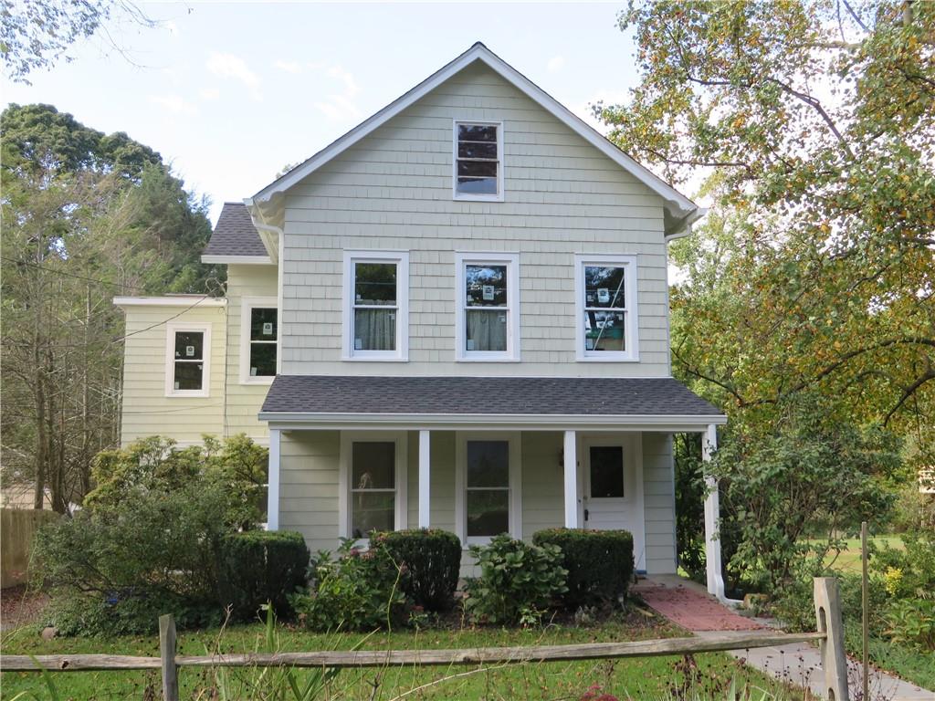 Welcome home! This charming home has so much to offer including the front porch. The main apartment is all updated with a beautiful level backyard.