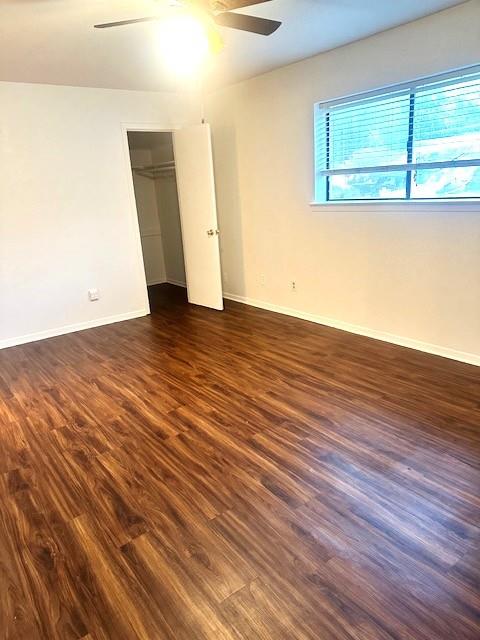 2736 Chebi Lane Denton, TX 76209 - Photo 11 of 17 an empty room with wooden floor and windows