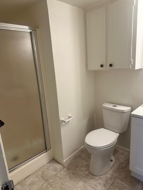 2736 Chebi Lane Denton, TX 76209 - Photo 15 of 17 a white toilet sitting next to a shower