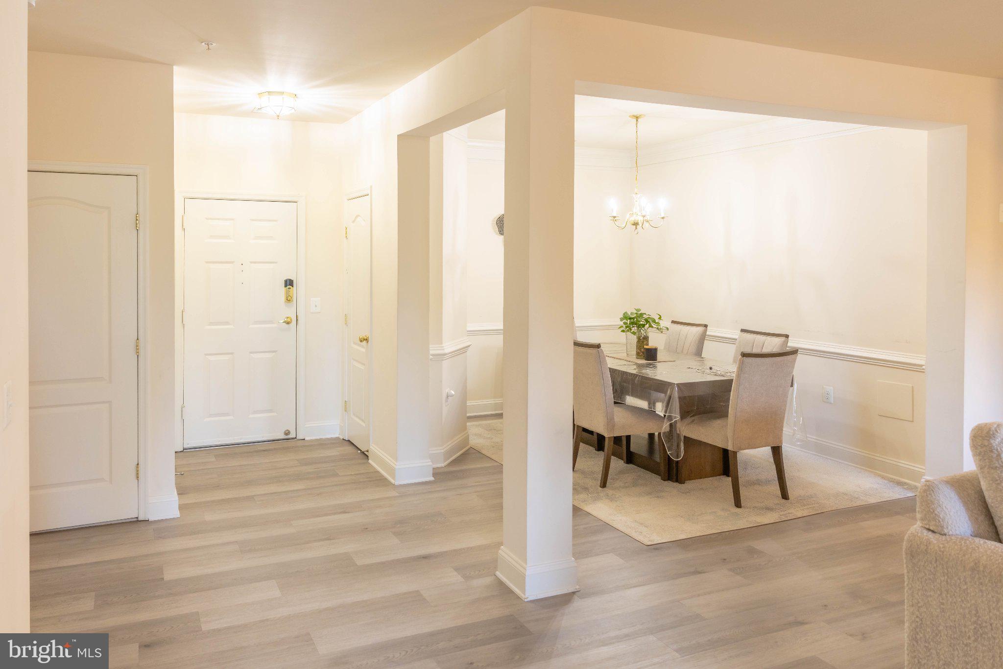12824 Clarksburg Square Road, Unit 105 Clarksburg, MD 20871 - Photo 44 of 96 Spacious entryway with dining area.