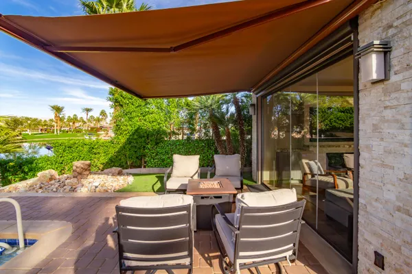 a view of a chairs setting on the deck