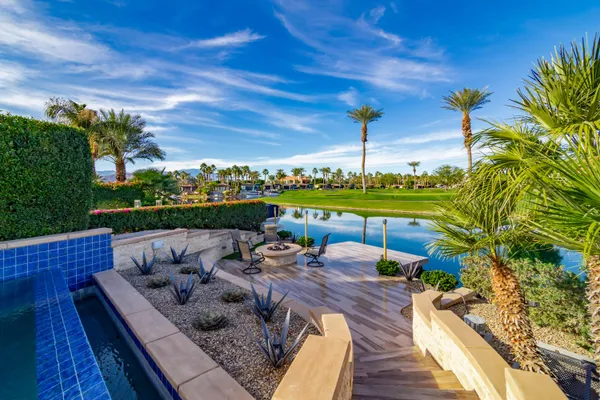 a aerial view of a house with a yard