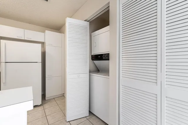 a kitchen with a refrigerator